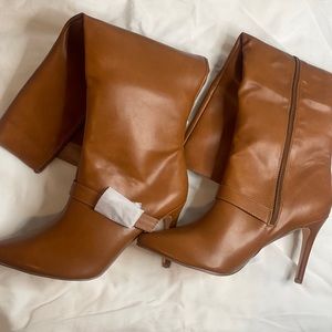 Never worn brown boot Heels , sooo cute size 11
